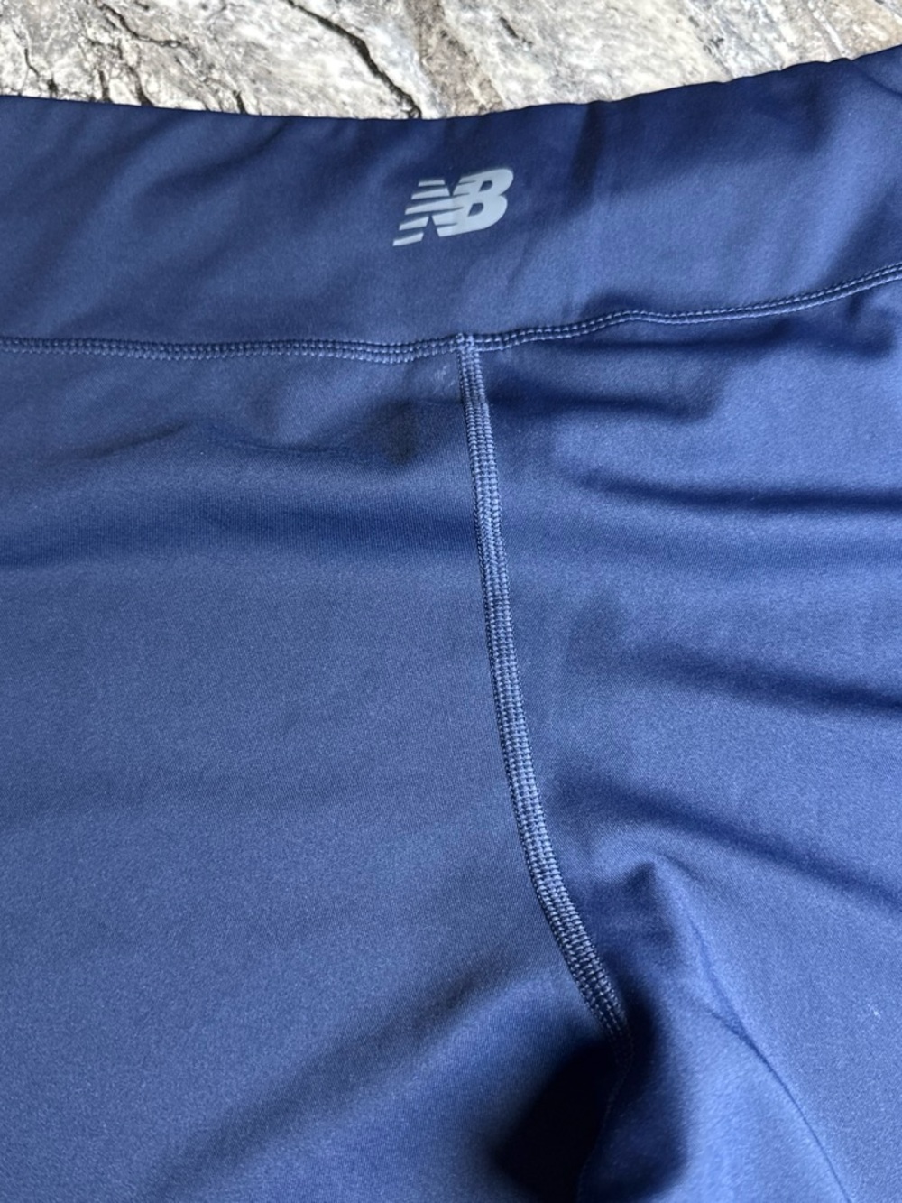New Balance Men's Navy Blue Athletic Shorts with Silver Logo